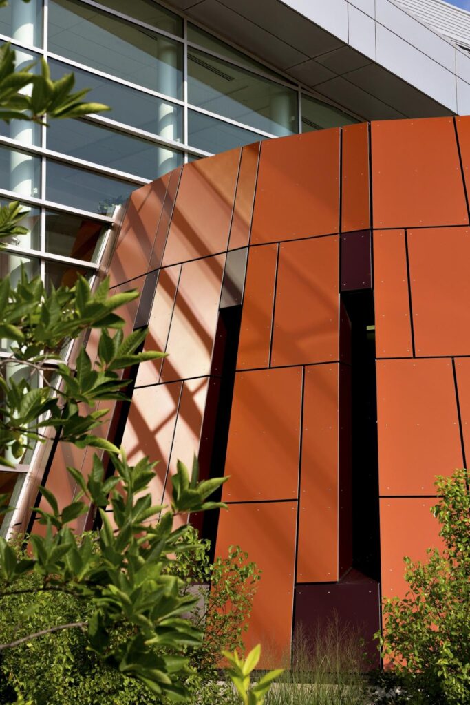 Exterior Education SectorFacade Trespa Compact Metallics M53 0 1 Copper RedUni Col A14 7 2 Deep Red Brown Mishigan State Universitys Brody Hall b
