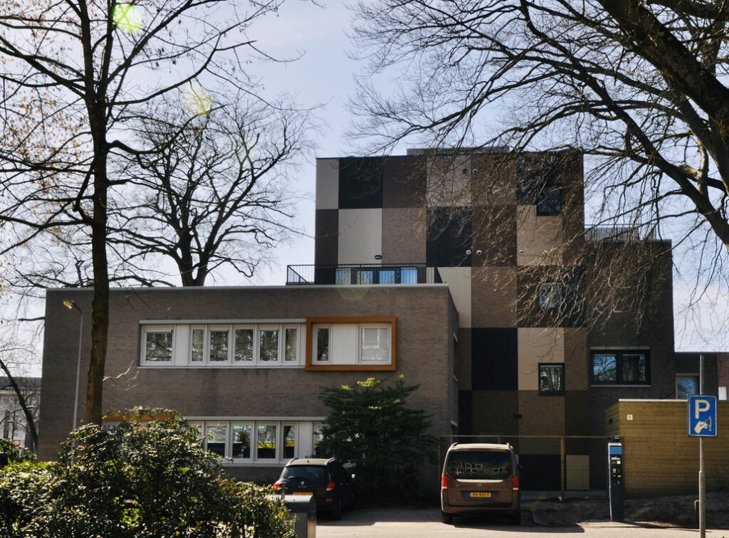 Exterior Residential Facade Trespa Meteon Compact Transformation from an office building to 28 apartments Hengelo b
