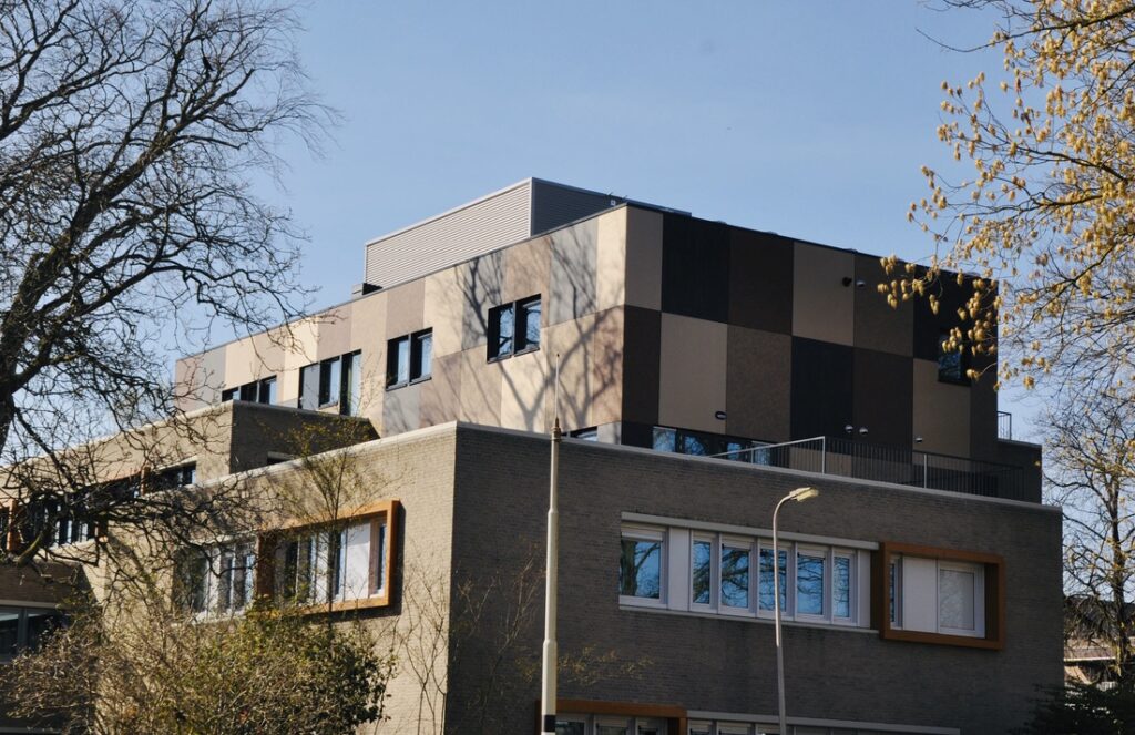 Exterior Residential Facade Trespa Meteon Compact Transformation from an office building to 28 apartments Hengelo c