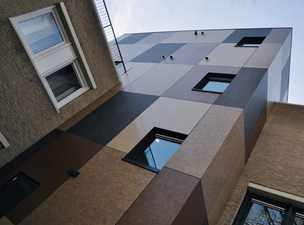 Exterior Residential Facade Trespa Meteon Compact Transformation from an office building to 28 apartments Hengelo d
